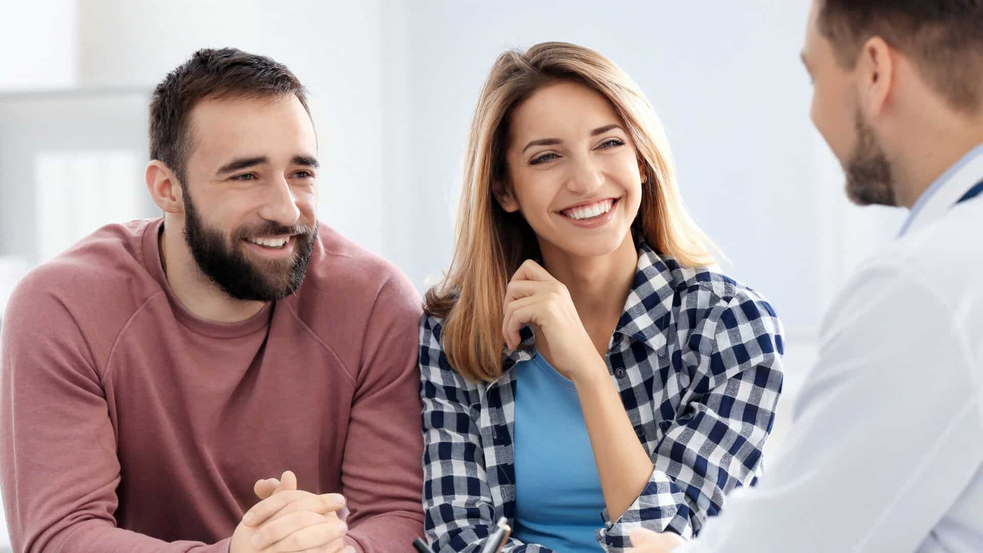 Couple discussing embryo adoption